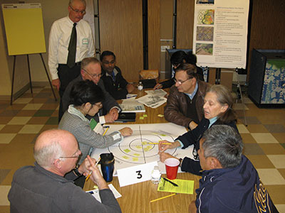 Participants share ideas about the Ten Mile Creek Limited Amendment at the November community meeting.