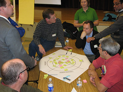 Participants share ideas about the Ten Mile Creek Limited Amendment at the November community meeting.