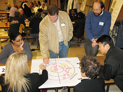 Participants share ideas about the Ten Mile Creek Limited Amendment at the November community meeting.