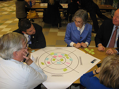 Participants share ideas about the Ten Mile Creek Limited Amendment at the November community meeting.