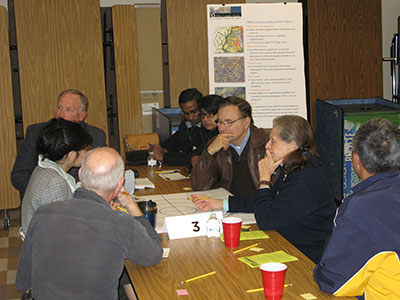 Participants share ideas about the Ten Mile Creek Limited Amendment at the November community meeting.