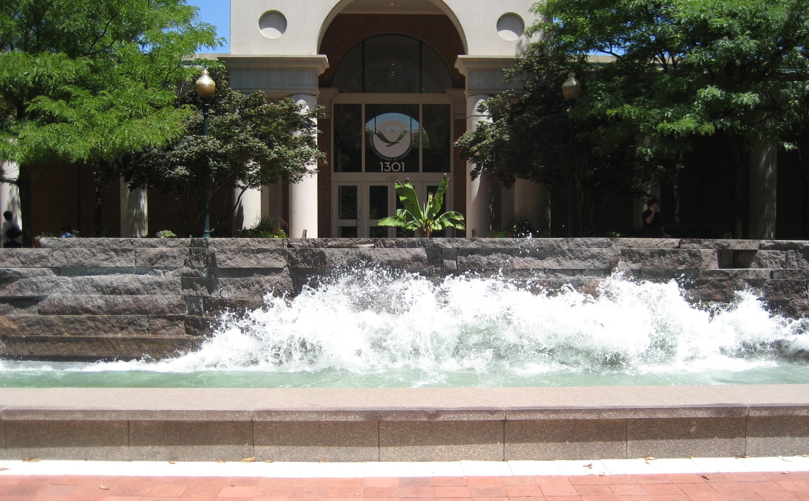 "Coastline" by Jim Sanborn, 1993; 1301 East West Hwy; Black granite, shells, water; 6ft by 30ft by 75ft.