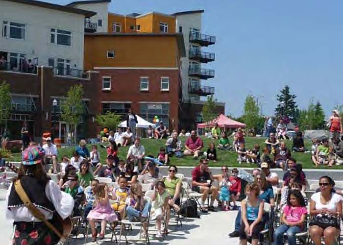 The shopping center area, envisioned as a town center, would have the greatest density and building heights as well as public benefits like a central gathering space. 