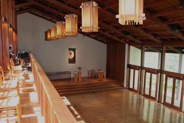 Wooden chandelier lights of the church 